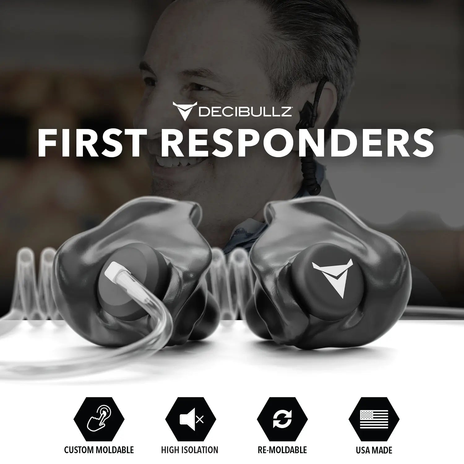 A promotional image for Decibullz, featuring +Isolation Custom Molded Two-Way Surveillance Acoustic Tube Headset (Motorola). The text reads "FIRST RESPONDERS." Icons below highlight features: custom moldable, high isolation, re-moldable, and USA made. Background shows a smiling person. Perfect for noise reduction in high-demand environments.