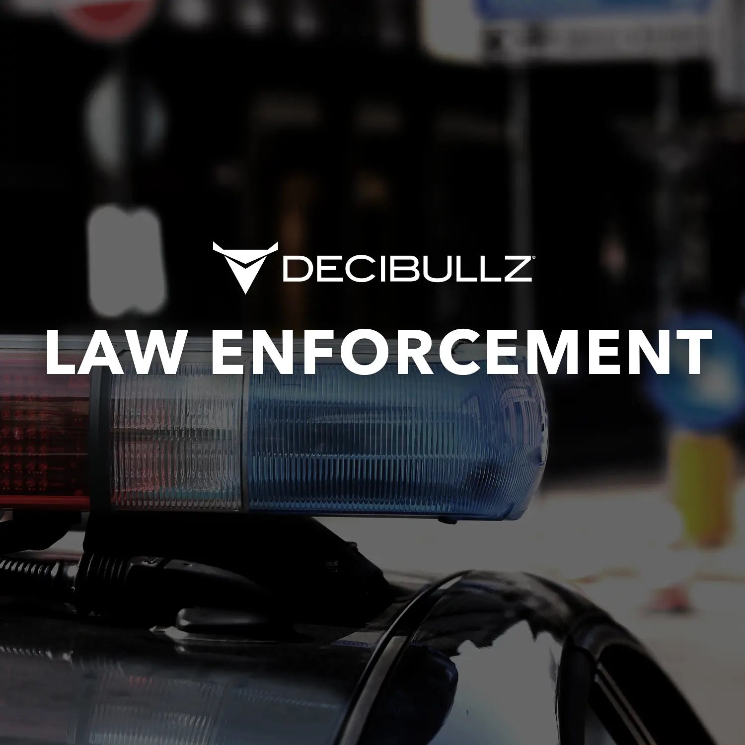 A black and white image with a red and blue siren light on top of a police car in the lower part. The text "DECIBULLZ LAW ENFORCEMENT" is prominently displayed in the center. Featuring Decibullz Two-Way Surveillance Acoustic Tube Headset (Motorola) with advanced acoustic tube technology for Motorola M1 compatibility.