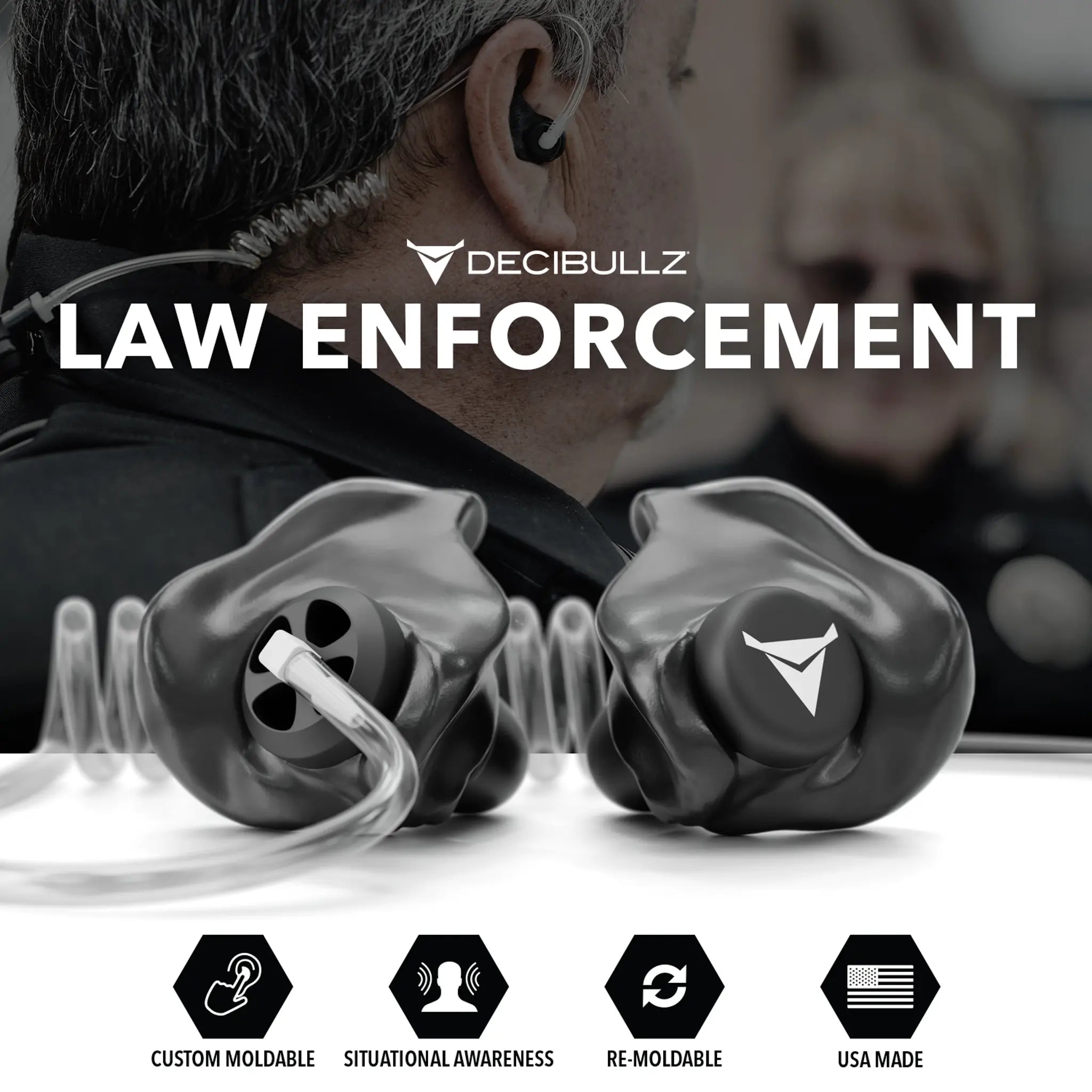 A promotional image for Decibullz Custom Moldable Surveillance Radio Headset Earpieces with Awareness designed for law enforcement. The foreground showcases custom moldable earpieces, featuring icons for custom moldable, situational awareness, re-moldable, and USA made. A blurred person in a police uniform with an acoustic tube radio headset is in the background.