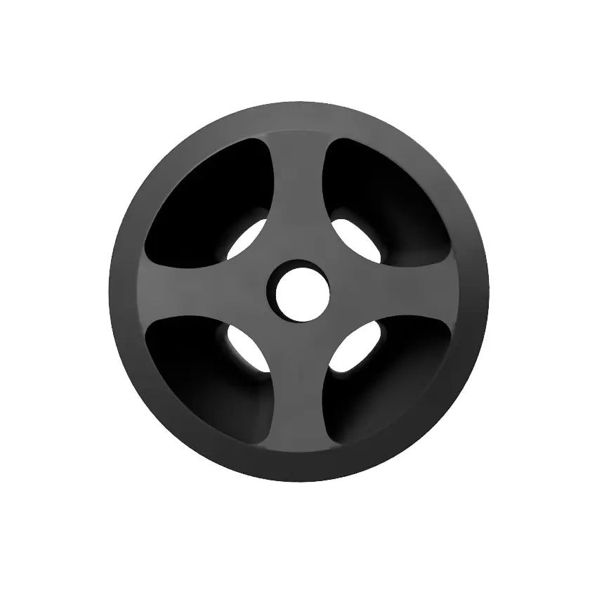 A black, circular object with a central hole and four symmetrically spaced cutouts, resembling a wheel or pulley. The design is reminiscent of the Decibullz REPLACEMENT Single +Awareness Radio Adapter Back Plug and fits perfectly in a minimalist setting. The background is white.