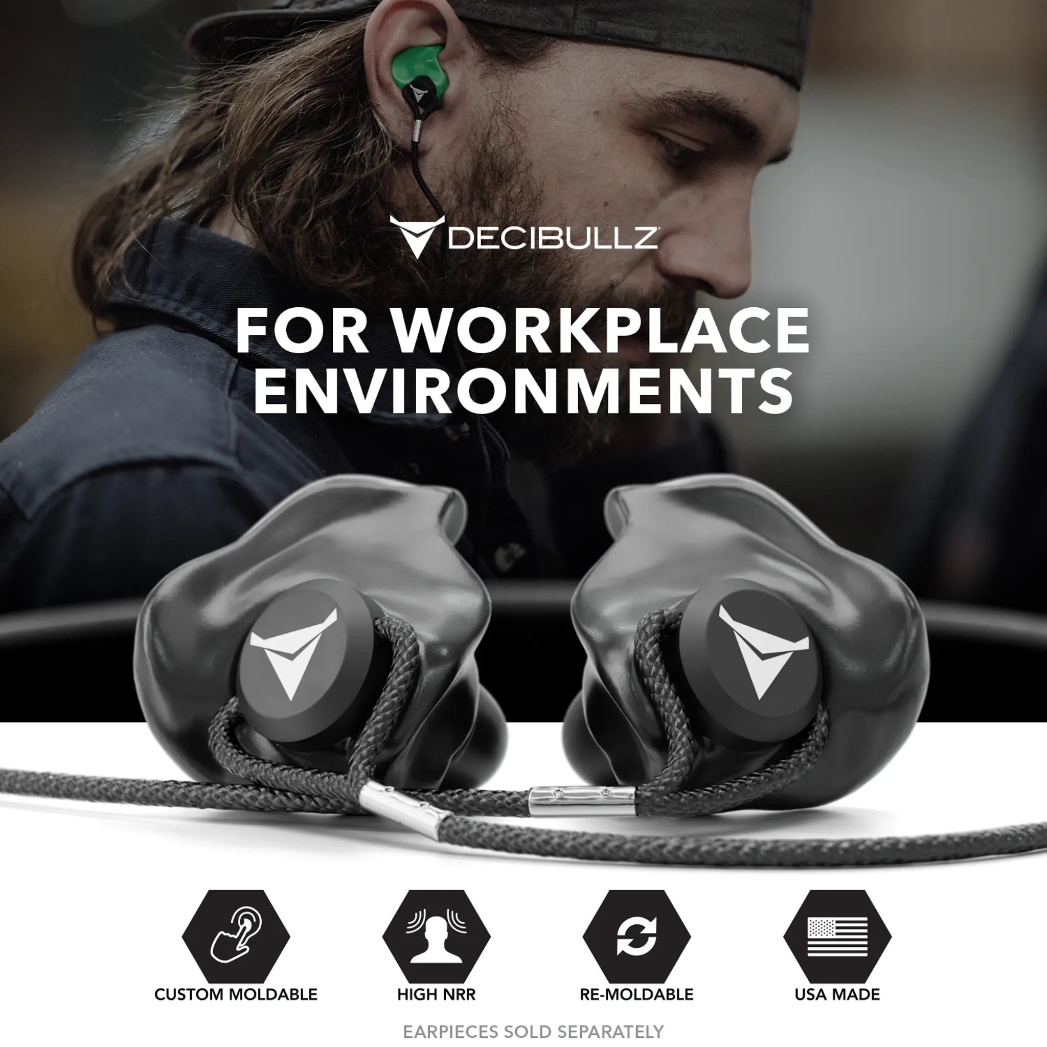 In the background, a person wearing green earpieces is visible. In the foreground, two black Decibullz Custom Molded Earplug Lanyards are displayed on a white surface with icons showing high NRR, remoldable features, and USA-made quality. The text reads "For Workplace Environments.