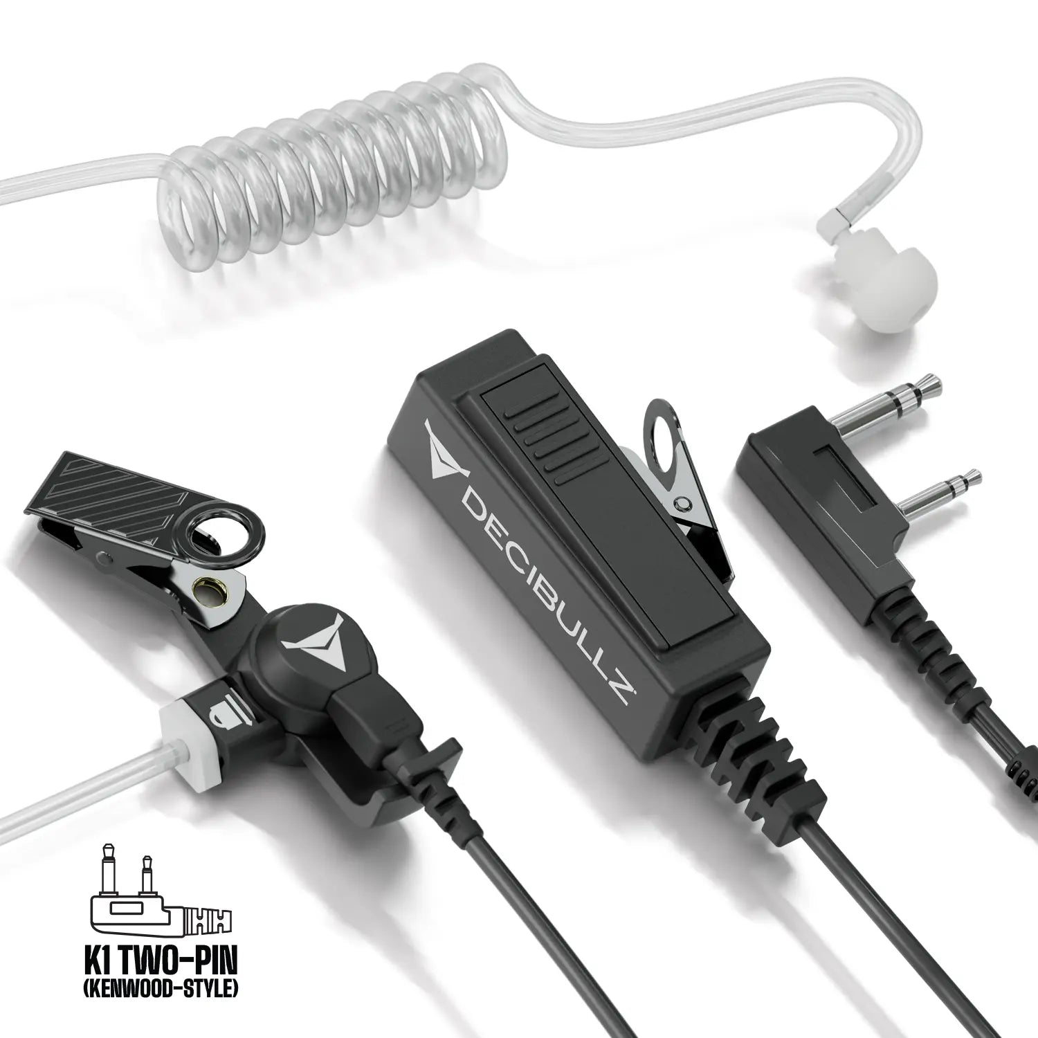 This image showcases the Decibullz Two-Way Surveillance Acoustic Tube Headset (Kenwood) with an attached coiled acoustic tube, clip, and two different connectors. The black-and-gray accessories use advanced acoustic tube technology. The Decibullz logo is visible on the main part of the device, making it perfect for a two-way surveillance headset setup.